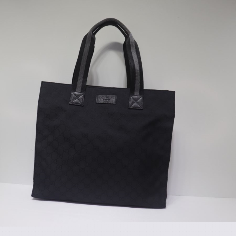 G*u*i shopping bags